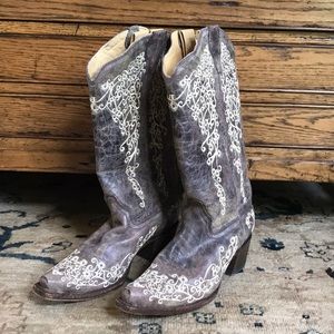 Cowboy boots with white stitching